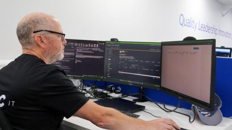 IT Engineer at their desk